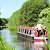 Barge cruising on the Calder & Hebble Navigation near Brighouse